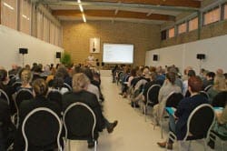 Publiek bij een lezing van Mark Kinet